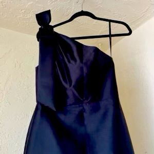 Formal black satin trumpet gown.